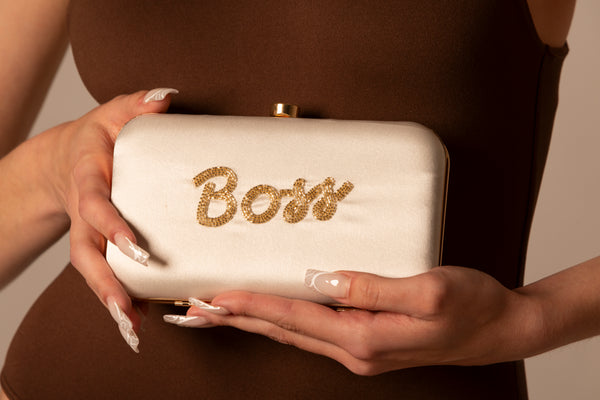 White Clutch Bag with Gold Hand Beaded Boss.White Clutch Bag with Gold Hand Beaded Boss.